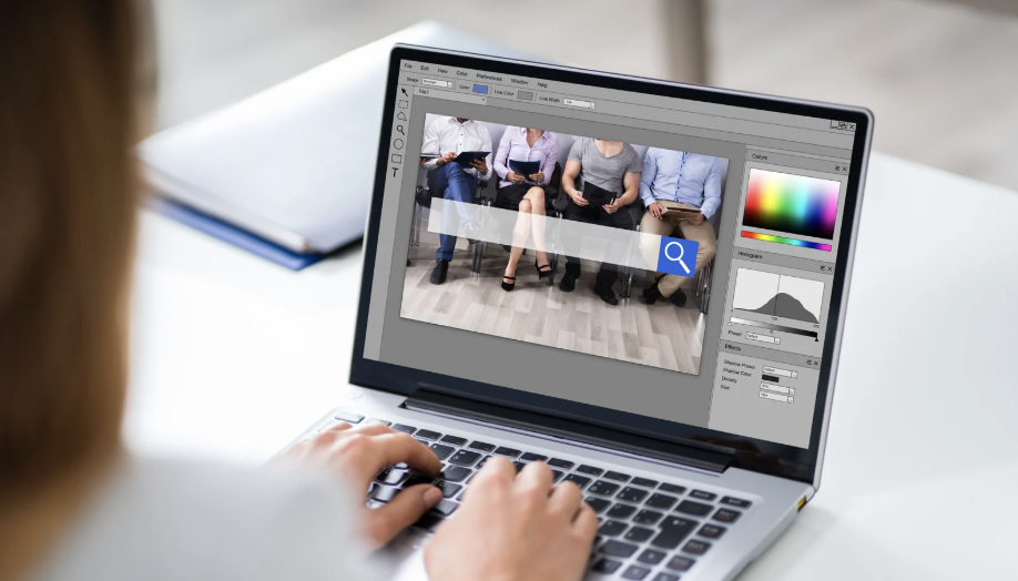 girl on computer editing photos